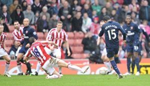 Denilson shoots past Dean Whitehead to score the Arsenal goal. Stoke City 3:1 Arsenal Denilson shoots past Dean Whitehead to score the Arsenal goal. Stoke City 3:1 Arsenal