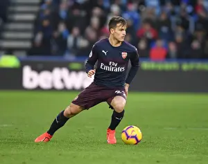 Denis Suarez in Action: Arsenal's Premier League Battle at Huddersfield