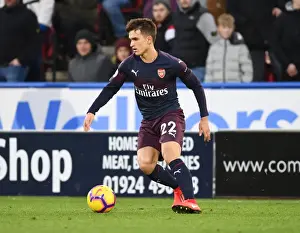 Denis Suarez in Action: Arsenal's Premier League Battle at Huddersfield