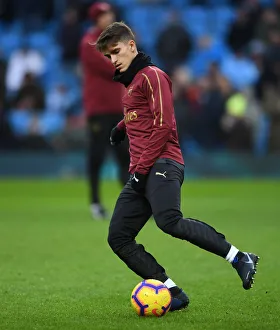 Manchester City V Arsenal 2018-19 Prints: Denis Suarez's Determined Preparation: Arsenal's Gear Up for Manchester City Showdown (Premier League 2018-19)