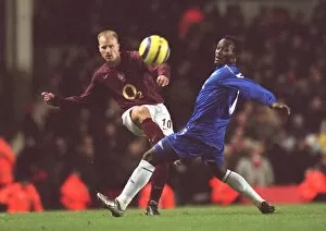 Arsenal v Chelsea 2005-6 Collection: Dennis Bergkamp (Arensal) Micahel Essien (Chelsea). Arsenal 0: 2 Chelsea