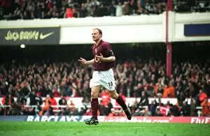 Dennis Bergkamp celebrates scoring the 3rd Arsenal goal