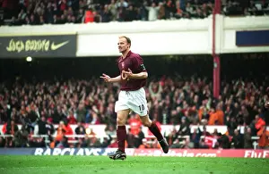 Dennis Bergkamp celebrates scoring the 3rd Arsenal goal