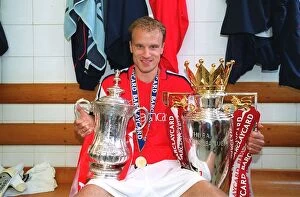 Arsenal v Everton Collection: Dennis Bergkamp Celebrating Double Victory: Arsenal's FA Premier League and FA Cup Triumph