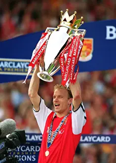 Dennis Bergkamp with the F. A. Barclaycard Premiership Trophy