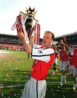 Dennis Bergkamp with the FA Barclaycard Premiership Trophy after Arsenal's 4:3 Victory over Everton, FA Barclaycard Premiership, Arsenal Stadium, Highbury, London, May 11, 2002