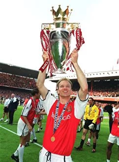 Images Dated 7th April 2005: Dennis Bergkamp with the F.A.Barclaycard Premiership Trophy