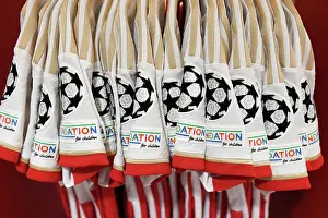 Detailed View of UEFA Foundation for Children Badge in Arsenal Dressing Room Before Arsenal vs PSV UEFA Champions League Match (2023-24)