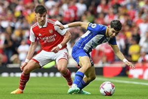 Images Dated 14th May 2023: Determined Duel: Kieran Tierney's Battle for Ball Possession - Arsenal vs Brighton
