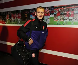 Determined Jack Wilshere in Action: Arsenal's Midfield Master vs. Queens Park Rangers (2012-13)
