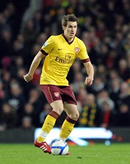 Manchester United v Arsenal FA Cup 2010-11 Collection: Determined Ramsey Shines in Manchester United's FA Cup Victory over Arsenal (2010)