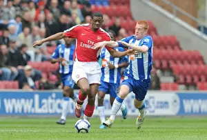 Wigan Athletic V Arsenal 2009-10 Prints: Diaby vs Watson: Wigan's Upset Over Arsenal in FA Premier League (3-2)