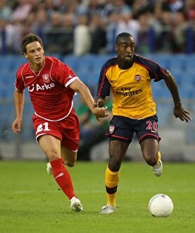 FC Twente v Arsenal Collection: Djourou and Arnautovic Lead Arsenal to Victory: FC Twente 0-2 Arsenal, Champions League Qualifier