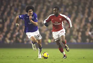 Everton V Arsenal 2008-9 Prints: Djourou vs. Fellaini: A Battle of Intense Rivalry at Goodison Park
