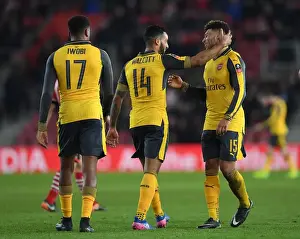 Double Trouble: Walcott and Oxlade-Chamberlain Score Twice in Arsenal's FA Cup Victory over Southampton