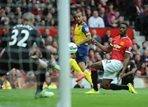 Manchester United V Arsenal 2014-15 Prints: Dramatic: Theo Walcott Scores Past Tyler Blackett in Manchester United vs