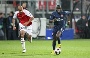 AZ Alkmaar V Arsenal 2009-10 Prints: Eboue vs. Poulsen: 1:1 Stalemate in the Champions League