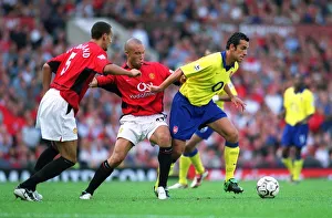 Edu Gallery: Edu (Arsenal) Mikael Silvestre and Rio Ferdinand (Manchester United)