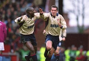 Images Dated 16th November 2006: Edu and Sol Campbell: Celebrating Arsenal's First Goal in a 2:1 Victory over Aston Villa, 2002