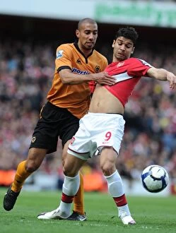 Arsenal v Wolverhampton Wanderers 2009-10 Collection: Eduardo (Arsenal) Carl Henry (Wolves). Arsenal 1: 0 Wolverhampton Wanderers