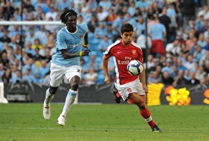 Images Dated 12th September 2009: Eduardo (Arsenal) Emmanuel Adebayor (Man City)
