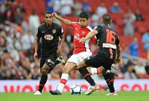 Eduardo (Arsenal) Juanito and Tomas Ujfalusi (Athletico Madrid)