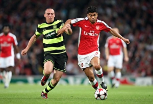 Arsenal v Celtic 2009-10 Collection: Eduardo (Arsenal) Scott Brown (Celtic)