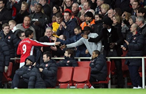 Images Dated 16th February 2009: Eduardo (Arsenal) shakes hands with Cesc Fabregas