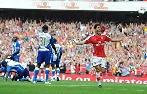Arsenal v Wigan Athletic 2009-10 Collection: Eduardo celebrates the 3rd Arsenal goal scored by Emmanuel Eboue
