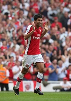 Arsenal v Wigan Athletic 2009-10 Collection: Eduardo celebrates Arsenals 3rd goal scored by Emmanuel Eboue