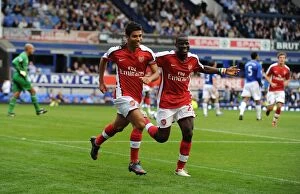 Images Dated 15th August 2009: Eduardo celebrates scoring the 6th Arsenal goal with Emmanuel Eboue