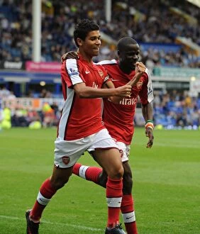 Images Dated 15th August 2009: Eduardo celebrates scoring the 6th Arsenal goal with Emmanuel Eboue