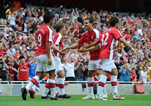 Eduardo celebrates scoring Arsenals 2nd goal with Cesc Fabregas