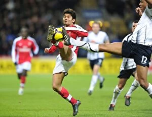 Bolton v Arsenal 2009-10 Collection: Eduardo Scores Duo: Arsenal Overpower Bolton 2-0 in Premier League