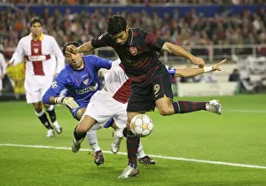 Seville V Arsenal 2007-8 Prints: Eduardo shoots past Daniel Alves & Andreas Palop to score the Arsenal goal