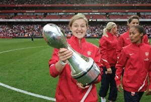 Arsenal v Swansea City 2011-12 Collection: Ellen White's Double Victory: Arsenal's WSL Title Celebration Amidst Premier League Action (2011)
