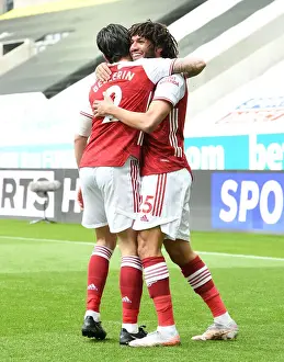 Elneny and Bellerin Celebrate Arsenal's Goal: Newcastle United vs Arsenal, 2021-22 Premier League