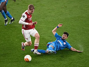 Emile Smith Rowe in Action: Arsenal vs. Olympiacos at Empty Emirates Stadium, 2021 UEFA Europa League Clash