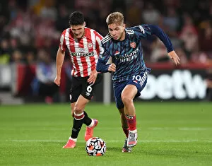 Images Dated 14th August 2021: Emile Smith Rowe Clashes with Christian Norgaard: Brentford vs. Arsenal, 2021-22 Premier League