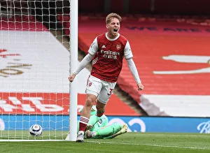 Emile Smith Rowe Scores the Winning Goal: Arsenal's Triumph in Empty Emirates Stadium Against West Bromwich Albion (2020-21)