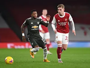 Arsenal V Manchester United 2020-21 Prints: Emile Smith Rowe Stands Firm Against Fred: Arsenal vs Manchester United at Empty Emirates (Premier League 2020-21)
