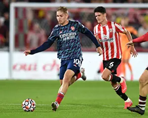 Brentford V Arsenal 2021-22 Prints: Emile Smith Rowe vs. Christian Norgaard: A Premier League Battle at Brentford Community Stadium (2021-22)