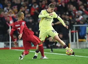 Images Dated 20th November 2021: Emile Smith Rowe vs Fabinho: Intense Battle at Anfield - Liverpool vs Arsenal