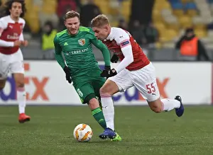 FC Vorskla Poltava V Arsenal 2018-19 Prints: Emile Smith Rowe vs Oleksandr Skliar: A Europa League Showdown