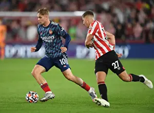 Emile Smith Rowe vs. Vitaly Janelt: A Premier League Battle - Arsenal vs. Brentford (2021-22)