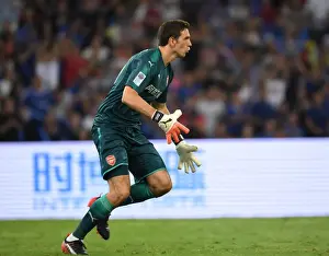 Emiliano Martinez: Arsenal's Defiant Goalkeeper in Action Against Chelsea in Beijing
