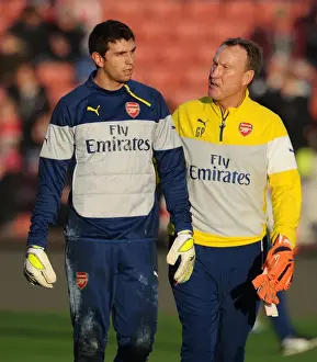 Stoke City V Arsenal 2014-15 Prints: Emiliano Martinez and Gerry Peyton: Arsenal's Goalkeeping Duo Prepare for Stoke City Clash (December 2014)