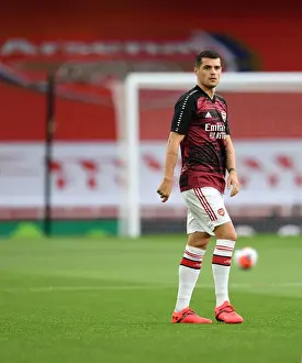 Arsenal V Liverpool 2019-20 Prints: Empty Emirates: Granit Xhaka of Arsenal Prepares for Premier League Clash Against Liverpool Amidst Coronavirus Pandemic