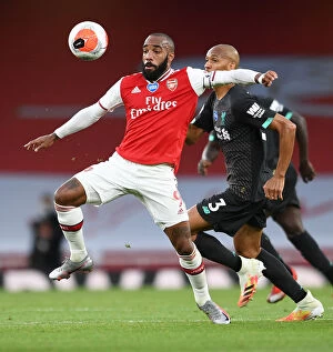 Images Dated 15th July 2020: Empty Emirates Rivalry: Lacazette vs. Fabinho - Arsenal vs. Liverpool (2020)
