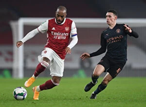 Arsenal v Manchester City - Carabao Cup 2020-21 Collection: Empty Emirates Rivalry: Lacazette vs Foden - Arsenal vs Manchester City Carabao Cup Showdown